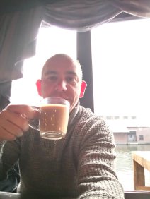 photo of author, and writer Steve Alexander drinking coffee and enjoying time out